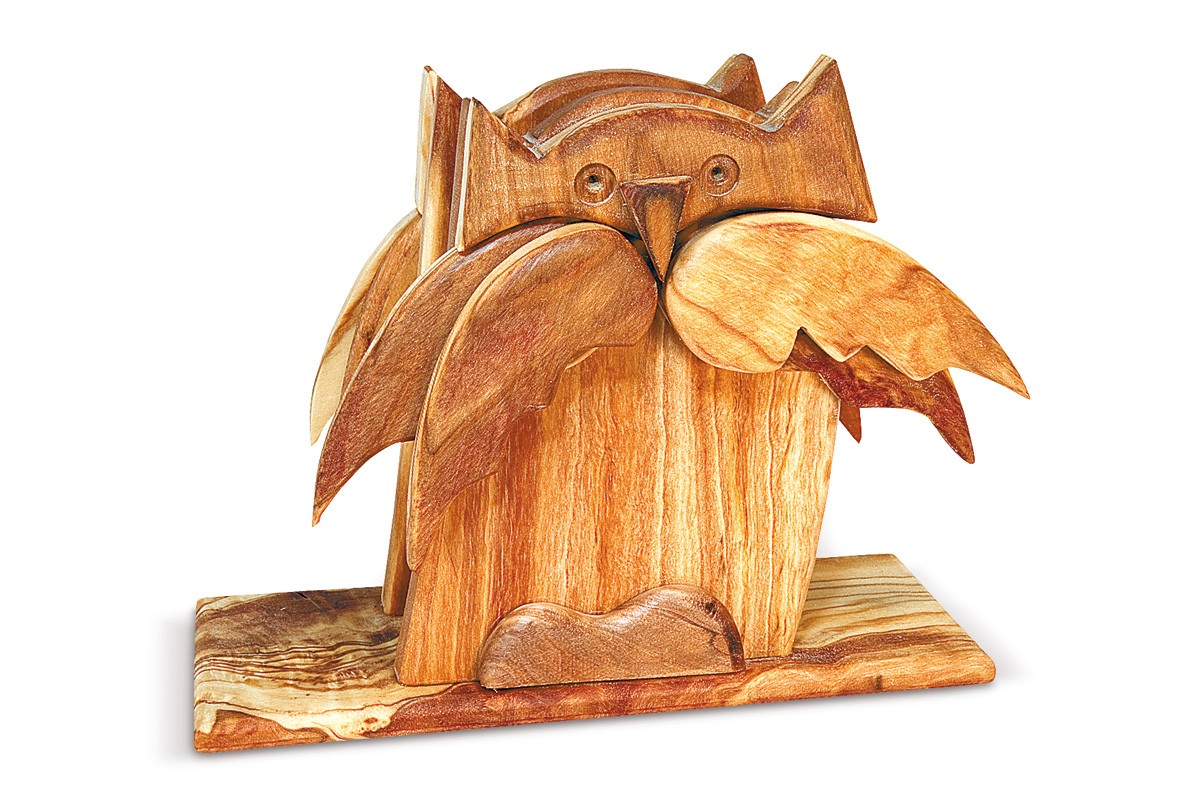 Napkin holder with owl relief 
